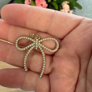 Elegant Gold Pearl Bow Pendant